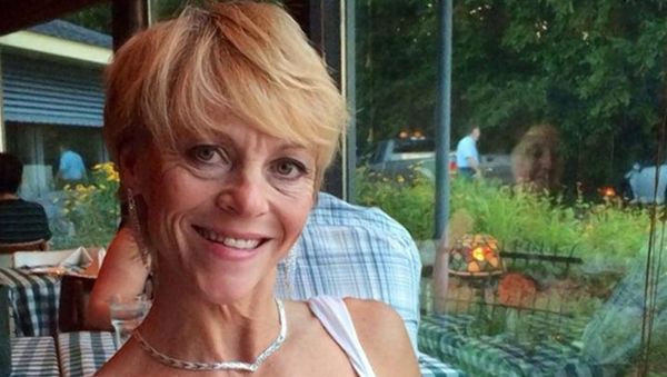 Christina Bond, 55, was repositioning her handgun inside her brassiere, looking down, when she fired a round in her eye. Christina Bond, 55, was repositioning her handgun inside her brassiere, looking down, when she fired a round in her eye. - Sputnik International