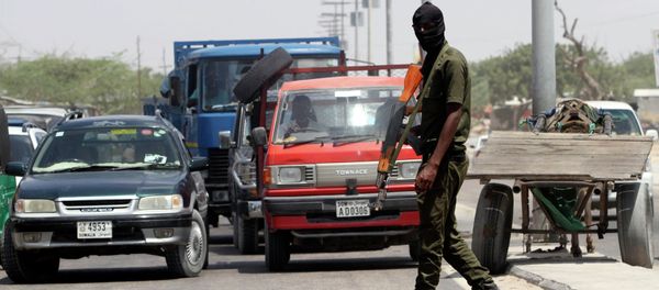 A member of Somali security forces patrols the streets in the capital Mogadishu A member of Somali security forces patrols the streets in the capital Mogadishu - Sputnik International