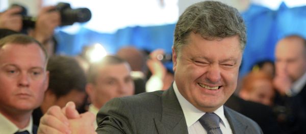Petro Poroshenko, Ukrainian presidential candidate, takes part in the early presidential election at a polling station in Kiev. Petro Poroshenko, Ukrainian presidential candidate, takes part in the early presidential election at a polling station in Kiev. - Sputnik International