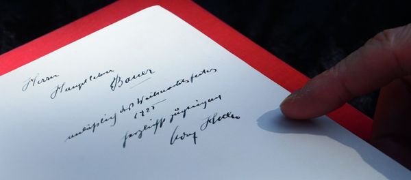 One of two rare copies of Mein Kampf signed by the young Nazi leader Adolf Hitler and due for auction, photographed in Los Angeles, California - Sputnik International