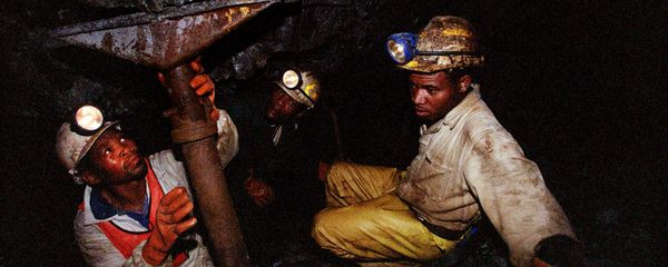 Miners work underground at the Harmony Goldmine, near Carletonville, South Africa, in this Wednesday Oct. 27, 2004 file photo. Some 3,000 miners were trapped underground when a water pipe burst and probably caused a shaft to collapse Wednesday, Oct. 3, 2007, in Harmony Gold's Elandsrand Mine near Johannesburg, South Africa's economic capital and gold-mining center Miners work underground at the Harmony Goldmine, near Carletonville, South Africa, in this Wednesday Oct. 27, 2004 file photo. Some 3,000 miners were trapped underground when a water pipe burst and probably caused a shaft to collapse Wednesday, Oct. 3, 2007, in Harmony Gold's Elandsrand Mine near Johannesburg, South Africa's economic capital and gold-mining center - Sputnik International