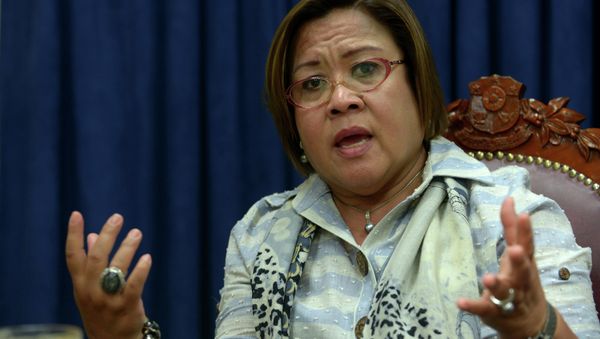 Philippine Justice Secretary Leila de Lima gesturing during an interview with AFP in Manila - Sputnik International