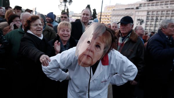 A performer impersonating German Chancellor Angela Merkel takes part in a performance outside Greece's parliament to support the newly elected government’s push for a better deal on Greece’s debt, in central Athens, on Sunday, Feb. 15, 2015 - Sputnik International
