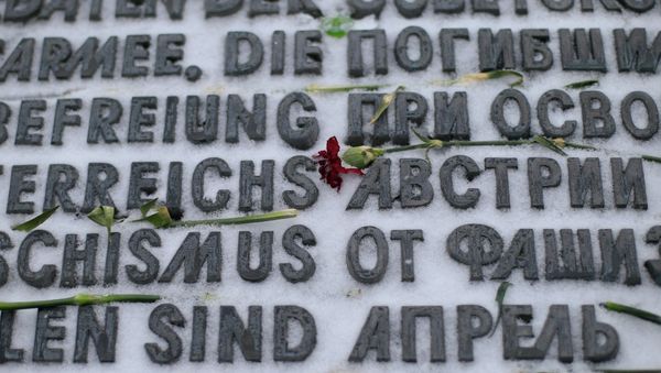 Snow covers text and flowers on the Soviet War Memorial (Heldendenkmal der Roten Armee) in Vienna Snow covers text and flowers on the Soviet War Memorial (Heldendenkmal der Roten Armee) in Vienna - Sputnik International