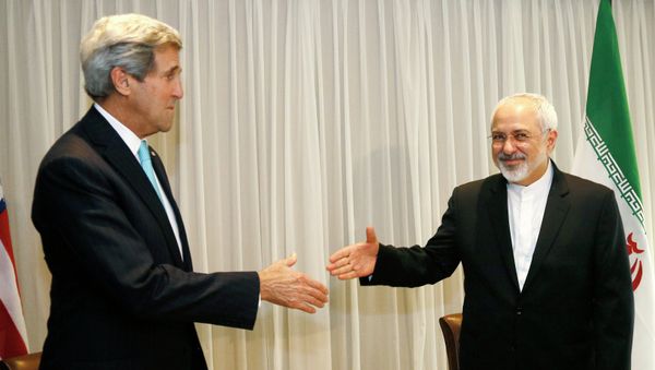 Iranian Foreign Minister Mohammad Javad Zarif shakes hands on January 14, 2015 with US State Secretary John Kerry in Geneva Iranian Foreign Minister Mohammad Javad Zarif shakes hands on January 14, 2015 with US State Secretary John Kerry in Geneva - Sputnik International
