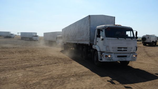 Convoy trucks on the way back to Russia after delivering humanitarian aid to Lugansk - Sputnik International