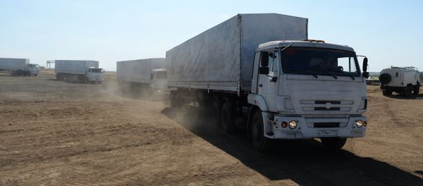 Convoy trucks on the way back to Russia after delivering humanitarian aid to Lugansk Convoy trucks on the way back to Russia after delivering humanitarian aid to Lugansk - Sputnik International