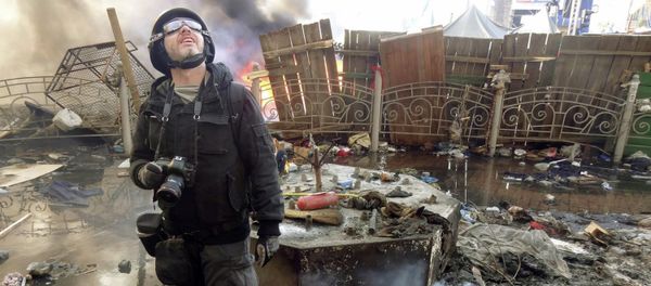Undated file picture taken in Kiev shows Andrei Stenin, a photographer working for Russian RIA Novosti press agency - Sputnik International
