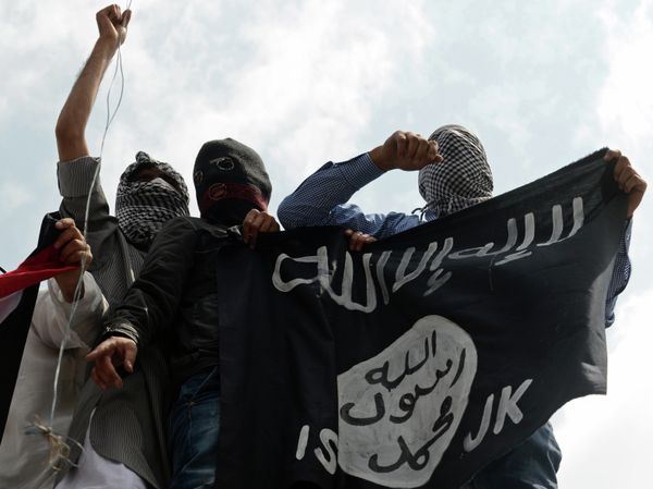 Kashmiri demonstrators hold up a flag of the Islamic State of Iraq and the Levant (ISIL) during a demonstration against Israeli military operations in Gaza Kashmiri demonstrators hold up a flag of the Islamic State of Iraq and the Levant (ISIL) during a demonstration against Israeli military operations in Gaza - Sputnik International