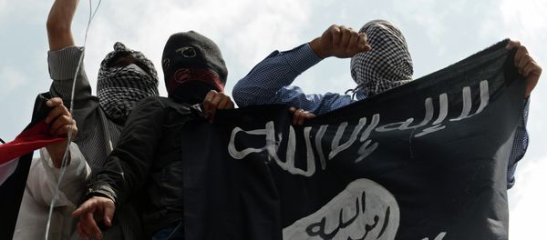 Kashmiri demonstrators hold up a flag of the Islamic State of Iraq and the Levant (ISIL) during a demonstration against Israeli military operations in Gaza Kashmiri demonstrators hold up a flag of the Islamic State of Iraq and the Levant (ISIL) during a demonstration against Israeli military operations in Gaza - Sputnik International