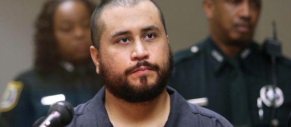George Zimmerman, acquitted in the high-profile killing of unarmed black teenager Trayvon Martin, listens in court, in Sanford, Fla., during his hearing on charges including aggravated assault stemming from a fight with his girlfriend. George Zimmerman, acquitted in the high-profile killing of unarmed black teenager Trayvon Martin, listens in court, in Sanford, Fla., during his hearing on charges including aggravated assault stemming from a fight with his girlfriend. - Sputnik International