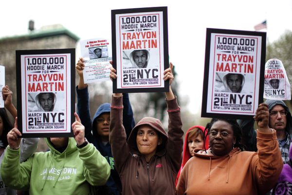 Demonstrators hold up signs during a rally for Trayvon Martin, Wednesday, March 21, 2012, in New York. Demonstrators hold up signs during a rally for Trayvon Martin, Wednesday, March 21, 2012, in New York. - Sputnik International