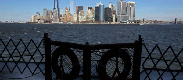 Lower Manhattan appears behind a pair life preservers on a Staten Island Ferry in New York Harbor. Lower Manhattan appears behind a pair life preservers on a Staten Island Ferry in New York Harbor. - Sputnik International