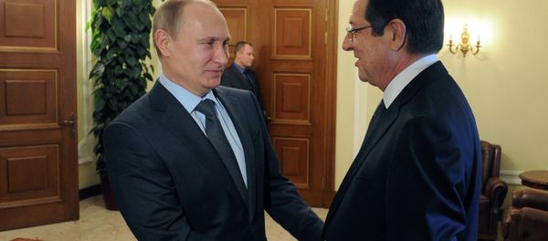 February 25, 2015. Russian President Vladimir Putin, left, and President of Cyprus Nicos Anastasiades meet in Novo-Ogaryovo - Sputnik International