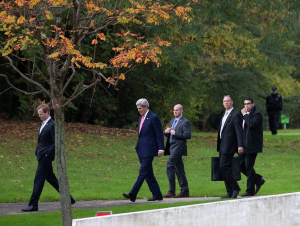 U.S. Secretary of State John Kerry, second left, walks in the grounds of the Intercontinental Hotel in Geneva, Switzerland, before a meeting with EU High Representative for Foreign Affairs, Catherine Ashton and Iranian Foreign Minister Mohammad Javad Zarif, Saturday Nov. 9, 2013.  - Sputnik International