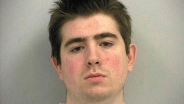 Craig Brittain, founder of a notorious revenge porn site - seen here in his mugshot, which is perfectly legal to post online - has demanded that Google remove content about him which he says was posted without his permission. - Sputnik International