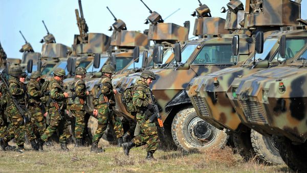 Soldiers of the Macedonian army prepare for military exercises during the Balkan Flash 2010 at Krivolak army training center, 120 km northeast of Skopje Soldiers of the Macedonian army prepare for military exercises during the Balkan Flash 2010 at Krivolak army training center, 120 km northeast of Skopje - Sputnik International