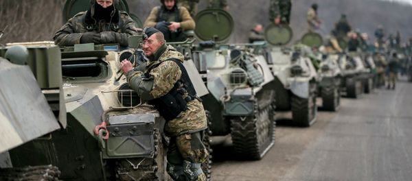 Members of the Ukrainian armed forces and armoured personnel carriers are seen preparing to move as they pull back from Debaltseve region, near Artemivsk Members of the Ukrainian armed forces and armoured personnel carriers are seen preparing to move as they pull back from Debaltseve region, near Artemivsk - Sputnik International