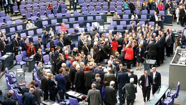 German deputies cast their vote on the approval to extend Greece's bailout, during a session of the Bundestag, the lower house of parliament, in Berlin February 27, 2015. German deputies cast their vote on the approval to extend Greece's bailout, during a session of the Bundestag, the lower house of parliament, in Berlin February 27, 2015. - Sputnik International