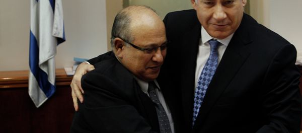 In this 2011 photo, Israel Prime Minister Benjamin Netanyahu hugs Meir Dagan, the then-director of Israel spy agency Mossad. - Sputnik International