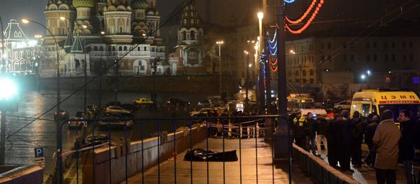 Police and medics surround the body of Boris Nemtsov, a leading opposition figure and former deputy prime minister, who was shot and killed near the Kremlin, Moscow in the early hours of Saturday, Feb. 28, 2015 Police and medics surround the body of Boris Nemtsov, a leading opposition figure and former deputy prime minister, who was shot and killed near the Kremlin, Moscow in the early hours of Saturday, Feb. 28, 2015 - Sputnik International