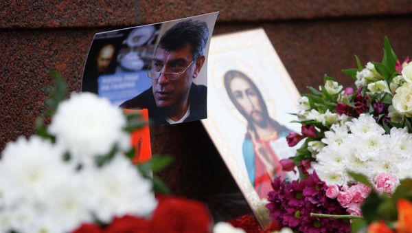 A photo, an icon and flowers are placed at the site where Boris Nemtsov was shot dead, near the Kremlin in central Moscow, February 28, 2015. A photo, an icon and flowers are placed at the site where Boris Nemtsov was shot dead, near the Kremlin in central Moscow, February 28, 2015. - Sputnik International