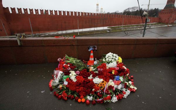 A photo, candles and flowers are placed at the site where Boris Nemtsov was shot dead, near the Kremlin in central Moscow, February 28, 2015. A photo, candles and flowers are placed at the site where Boris Nemtsov was shot dead, near the Kremlin in central Moscow, February 28, 2015. - Sputnik International