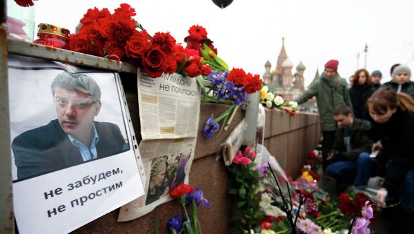 People gather at the site where Boris Nemtsov was recently murdered, with St. Basil's Cathedral seen in the background, in central Moscow, February 28, 2015. People gather at the site where Boris Nemtsov was recently murdered, with St. Basil's Cathedral seen in the background, in central Moscow, February 28, 2015. - Sputnik International