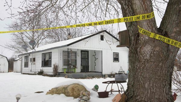 Police tape surrounds one of the crime scenes where gunman, Joseph Jesse Aldridge, killed seven people on Thursday night in Tyrone, Missouri - Sputnik International