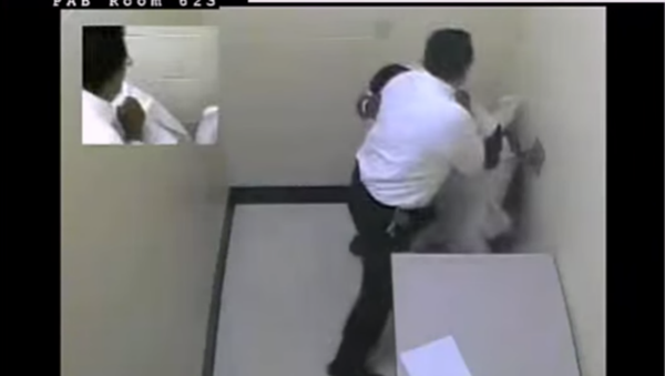 Gomez was charged with two felonies and fired from the police department back in Dec. 2013. He appealed, claiming that he “feared for his safety” as Love yelled at him while chained to the wall, prompting him to savagely beat him. Gomez was charged with two felonies and fired from the police department back in Dec. 2013. He appealed, claiming that he “feared for his safety” as Love yelled at him while chained to the wall, prompting him to savagely beat him. - Sputnik International