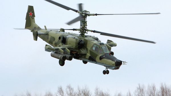 The Kamov Ka-50 attack helicopter, nicknamed the 'Black Shark' (Chernaya Akula), as it often features a matte black paint job. - Sputnik International