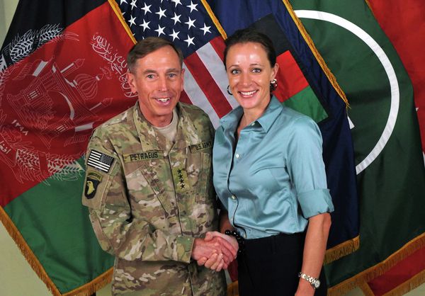 Former Commander of International Security Assistance Force and U.S. Forces-Afghanistan Gen. Davis Petraeus, left, shaking hands with Paula Broadwell, co-author of All In: The Education of General David Petraeus. Petraeus resigned as CIA director over his extramarital affair with his biographer, Broadwell. Former Commander of International Security Assistance Force and U.S. Forces-Afghanistan Gen. Davis Petraeus, left, shaking hands with Paula Broadwell, co-author of All In: The Education of General David Petraeus. Petraeus resigned as CIA director over his extramarital affair with his biographer, Broadwell. - Sputnik International