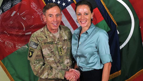 Former Commander of International Security Assistance Force and U.S. Forces-Afghanistan Gen. Davis Petraeus, left, shaking hands with Paula Broadwell, co-author of All In: The Education of General David Petraeus. Petraeus resigned as CIA director over his extramarital affair with his biographer, Broadwell. - Sputnik International