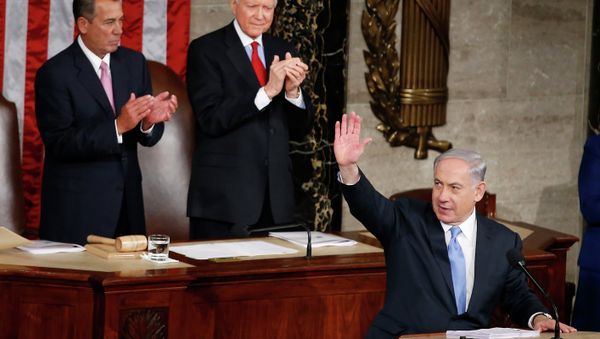 Israeli Prime Minister Benjamin Netanyahu waves as he steps to the podium prior to speaking before a joint meeting of Congress on Capitol Hill. Israeli Prime Minister Benjamin Netanyahu waves as he steps to the podium prior to speaking before a joint meeting of Congress on Capitol Hill. - Sputnik International