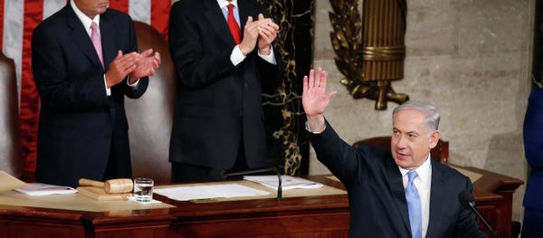 Israeli Prime Minister Benjamin Netanyahu waves as he steps to the podium prior to speaking before a joint meeting of Congress on Capitol Hill. Israeli Prime Minister Benjamin Netanyahu waves as he steps to the podium prior to speaking before a joint meeting of Congress on Capitol Hill. - Sputnik International