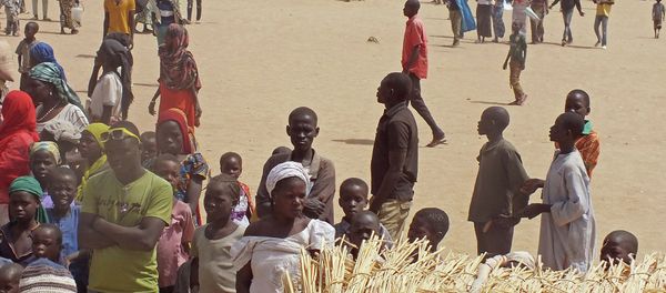In this photo taken on Wednesday, Feb. 25, 2015, refugees that fled their homes due to violence from the Islamic extremists group Boko Haram inside a refugee camp in Minawao, Cameroon In this photo taken on Wednesday, Feb. 25, 2015, refugees that fled their homes due to violence from the Islamic extremists group Boko Haram inside a refugee camp in Minawao, Cameroon - Sputnik International