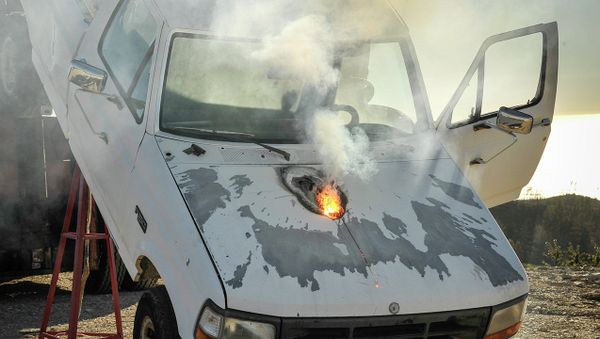 Lockheed Martin ATHENA laser weapon system defeats a truck target by disabling the engine, demonstrating its military effectiveness against enemy ground vehicles - Sputnik International