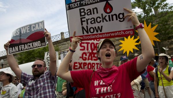 Demonstrators protest during a rally against fracking in Washington in July 2014. Demonstrators protest during a rally against fracking in Washington in July 2014. - Sputnik International