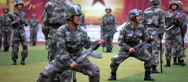 Chinese People's Liberation Army cadets shout as they take part in a bayonet drills at the PLA's Armoured Forces Engineering Academy Base, on the outskirt of Beijing, China - Sputnik International