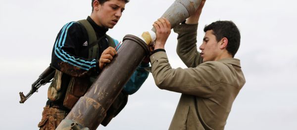 Members of al Qaeda's Nusra Front prepare to fire a mortar towards forces loyal to Syria's President Bashar al-Assad in al-Mallah farms, north of Aleppo, February 18, 2015 Members of al Qaeda's Nusra Front prepare to fire a mortar towards forces loyal to Syria's President Bashar al-Assad in al-Mallah farms, north of Aleppo, February 18, 2015 - Sputnik International