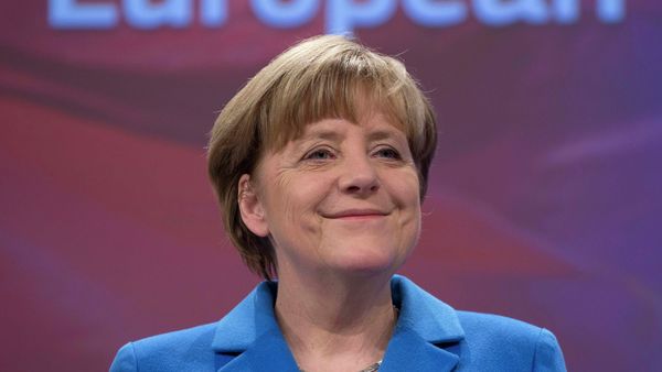 German Chancellor Angela Merkel smiles during a joint news conference with European Commission President Jean-Claude Juncker at the EC headquarters in Brussels March 4, 2015 German Chancellor Angela Merkel smiles during a joint news conference with European Commission President Jean-Claude Juncker at the EC headquarters in Brussels March 4, 2015 - Sputnik International