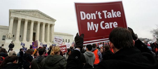 Demonstrators in favor of Obamacare gather at the Supreme Court building in Washington March 4, 2015 Demonstrators in favor of Obamacare gather at the Supreme Court building in Washington March 4, 2015 - Sputnik International