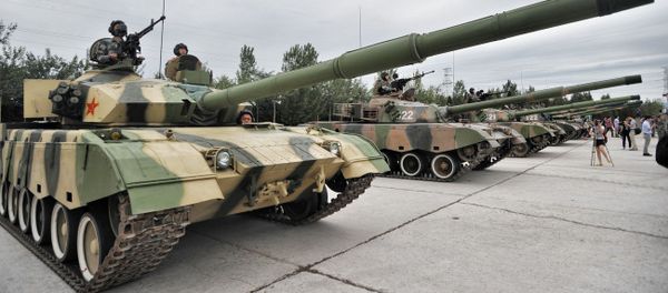 Chinese soldiers pose in tanks during a training session at the Academy of Armored Forces Engineering of the Peoples Liberation Army (PLA) in Beijing, China, 22 July 2014 - Sputnik International