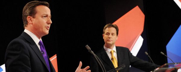 Conservative leader David Cameron, left, and Liberal Democrat Party leader Nick Clegg, centre, take part in Britain's second televised election debate in Bristol, England, Thursday, April 22, 2010. - Sputnik International