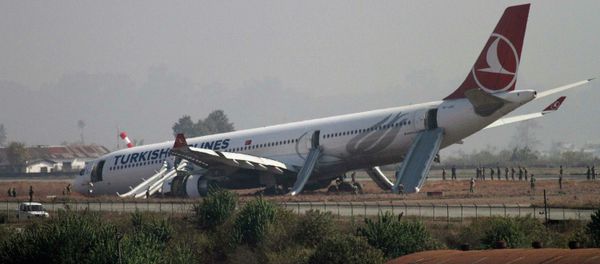 A Turkish Airlines plane lies on the field after it overshot the runway at Tribhuvan International Airport in Kathmandu March 4, 2015 A Turkish Airlines plane lies on the field after it overshot the runway at Tribhuvan International Airport in Kathmandu March 4, 2015 - Sputnik International