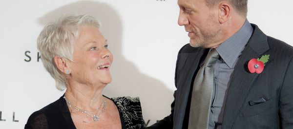 Actors Daniel Craig, right, and Dame Judi Dench pose for photographs at the photo call for the new James Bond film titled Skyfall. - Sputnik International