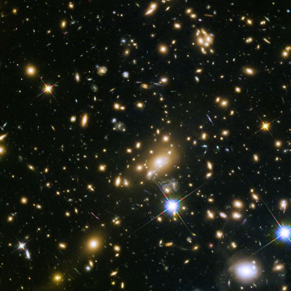 An example of a galaxy cluster: the galaxy cluster MACS J1149.5+223, whose light took over 5 billion years to reach us. An example of a galaxy cluster: the galaxy cluster MACS J1149.5+223, whose light took over 5 billion years to reach us. - Sputnik International