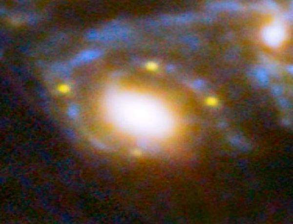 Four different images of the same supernova whose light has been distorted and magnified by the huge galaxy cluster MACS J1149+2223 in front of it. Four different images of the same supernova whose light has been distorted and magnified by the huge galaxy cluster MACS J1149+2223 in front of it. - Sputnik International