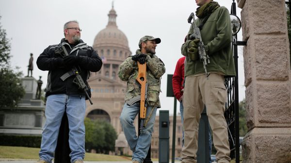 In this Jan. 13, 2015 file photo, gun rights advocates carry rifles while protesting outside the Texas Capitol in Austin, Texas - Sputnik International
