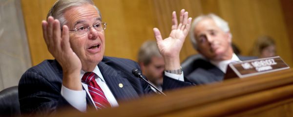 Chairman of the Senate Foreign Relations Committee, Sen. Robert Menendez, D-NJ., left, gestures as he speaks as ranking member Sen. Bob Corker, R-Tenn., sits right, during a hearing on Capitol Hill in Washington, Wednesday, July 9, 2014, to examine Russia and developments in Ukraine. - Sputnik International